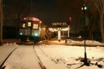 Waiting at Depot St (lit switch lantern)