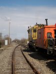 EJ&E Crane 245 with caboose travel west...