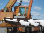 Frank watches the 10,000lb panel closely