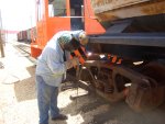 07.15.09 - NEIL IS WELDING THE PLATE ONTO THE "AL" BODY BOLSTER JACKING PAD.  IF WE COULD FIND THE MISSING BRAKE ROD, THE CAR WOULD BE READY TO RUN.