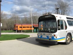Edmonton BBC 181 sits in front of the Andersen Garage as IT 518 occupies the carline 04/23/2011.