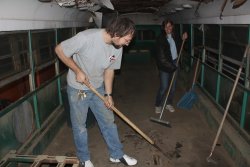 Richard Schauer and Julie Piesciuk taking up the old rubber flooring on the LA Brill 8002 09/25/2010