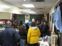 The crowd inside the diner annex.