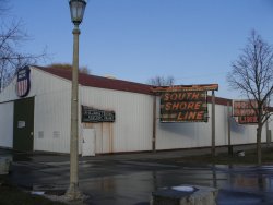 Other neon signs awaiting restoration across from the signal display (11/2005).