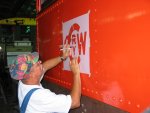 New logo being stenciled to cab