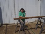 05.17.09 - NEW VOLUNTEER KIM BALETTO IS NEEDLE CHIPPPING THE UPPER DOOR TRACK.