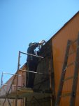 05-17.09 - VICTOR HUMPHREYS IS WIRE WHEELING THE EDGE OF THE ROOF.  HE WILL THEN PRIME IT.