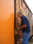 07.19.09 - THE FOUR DOOR STOPS AND A HANDHOLD WERE REMOVED TO DAY, SO THAT WOOD REPLACEMENT COULD CONTINUE.   HERE, GERRY McGONIGLE IS TAKING OFF THE HANDHOLD.