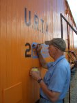 07.26.09 - BOB KUTELLA IS PAINTING THE NUMBERS.  SOME IS DONE FREEHAND AND SOME IS DONE INSIDE THE TAPED AREA.