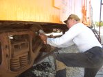 08.02.09 - VICTOR HUMPHREYS IS WIRE WHEELING THE "BR" TRUCK AFTER NEEDLE CHIPPING TO PREPARE THE TRUCK FOR PRIMER.