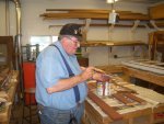 08.12.09 - JIM GRIFFITH IS PRIMING SOME OF THE SIDING PIECES MILLED TODAY.  KIRK WARNER MILLED 25 LOWER DOOR PIECES, TWO SIDE DOOR TRIM PIECES AND ONE PIECE OF SIDING, WHICH WILL COMPLETE THE WOOD REPLACEMENT ON THE CAR.