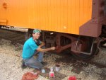 09.06.09 - TAKING A BREAK FROM NEEDLE CHIPPING, JOHN BALETTO IS PRIMING THE "BL" TRUCK WHICH RAY POLLICE PREPARED YESTERDAY.