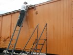 05.30.10 - IN THIS BOB KUTELLA PHOTO, VICTOR HUMPHREYS IS CHANGING THE PAINT ON THE ROOF EDGE TO MATCH THE 1960 PHOTO.