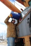 Frank does the honors of topping off the transmission fluid in the Model 50 Burro