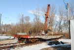 Unloading 6000 lb concrete blocks.  Big cranes are handy tools