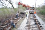 Using the crane as a track jack.