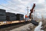 Unloading bundles of 20 & 25 along the mainline. 3-13-11