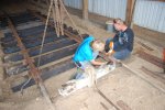 Mark and Tim bolt up the temp comp joint to tie the first new panel of track into track 31. 