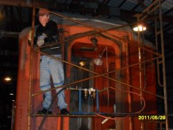 Mark Hoffman installing scaffolding in Barn 3 prior to neddlechipping exterior area around buffer Summer project on John Mcloughlin May 2011
