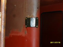 AFTER DRILLING AND TAPING HOLES, THE BRACKET IS INSTALLED JULY 15,2011