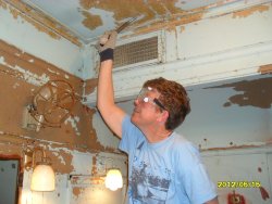 Nancy Ring was helping with  the job of scraping the old paint 5-15-12   