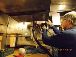 Another view of Gerry working in tight quarters in kitchen of L&N Diner