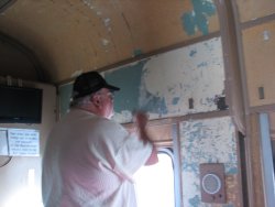 Mike peeling paint from the walls in Pacific Peak March 3, 2013.