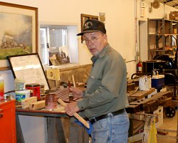 Pete G. in the shop painting parts for Charles City Western 300