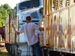 Jamie K. riding C&NW 411 to couple up to the Silver Pilot for departure - Photo by Brian LaKemper