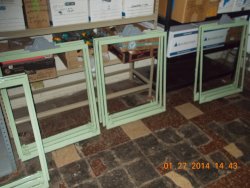 Part of the 18 frames waiting for the arrival of the glass panes.