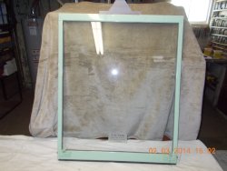 Now ...Here is a similar frame repainted with installed workable window latches, new bottom gasket and "caution" sign applied DSCN0725