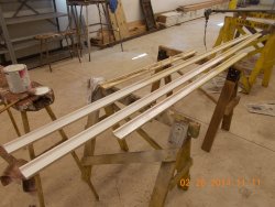   Roger primed popular wood window sills     Paul Cronin cut them into the correct shape   2-26-14   DSCN0737