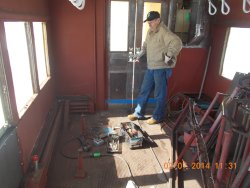 Gary's next project.   Rmoving more rusty steel   This time behind  the nickel seats  3-6-14 DSCN0746 -