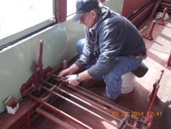 A first, Gary reinstalling a seat frame  We have 12 move to clean and paint.  3-26-14   DSCN0770