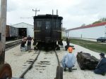 05.01.05 -  THE CAR IS BEING JACKED UP BY THE TRACK DEPARTMENT MEMBERS TO CHANGE A DAMAGED PAIR OF WHEELS.