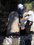 Warren and Jerry doing some filling by hand between the two culverts.