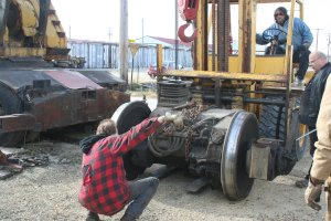 Jeff C. running the forklift to move the combo into the shop.