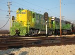 IT 1605 on the head end of a string of diesels