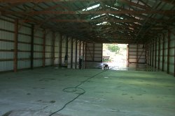 The new concrete floor, freshly poured in June 2003.