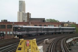 CTA 6000s & 22 going around the Sheridan curve during the "Ali" movie fantrip May 2001.