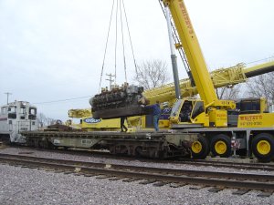 The Winton engine is loaded on IRM's ex DODX flat for the short trip to the property. 