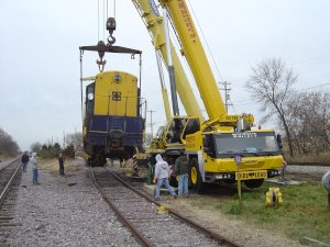 The 543 is slowly lowered to the track. 