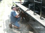 07.27.08 - KIRK WARNER DRILLS A HOLE IN THE LEFT RUNNING BOARD TO ATTACH IT TO THE MOUNTING BRACKETS.