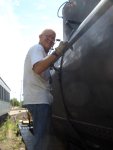 08.06.08 - DICK CUBBAGE IS SANDING THE RIVETS IN PREPARATION FOR HAVING THE TANK RESPRAYED.