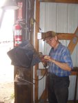 08.13.08 - VICTOR HUMPHREYS IS GRINDING OF THE SECUREMENT BOLTS ON THE PLACARD HOLDR.