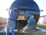 11.22.09 - BOB AND VICTOR HUMPHREYS ARE POSITIONING THE STENCIL.