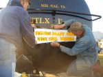 11.22.09 - WITH STENCILING COMPLETE, VICTOR AND BOB BEGIN TO REMOVE THE STENCIL.